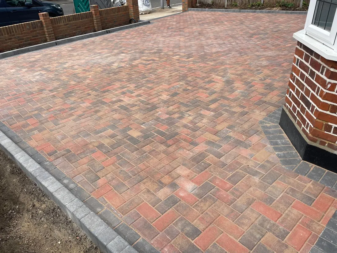 A closer view of the finished block paving in Epsom, showing the herringbone pattern and jointing detail