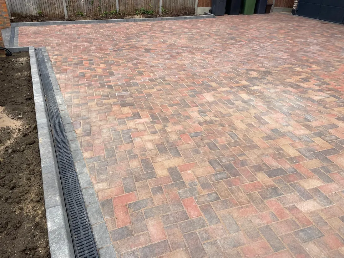 The completed block paved driveway in Epsom viewed from a different angle, showing the full width of the paving